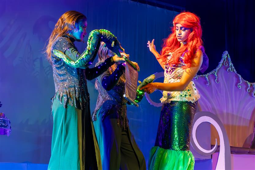 Students perform onstage